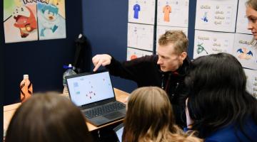 Students explore how data analysis can help make informed business decisions at the 2024 TeenTech Lancashire Festival